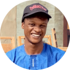 A profile picture of a smiling Temikay